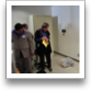 F. Jabbar & G Zywno observe the Wireless Multipurpose Mobile Unit...